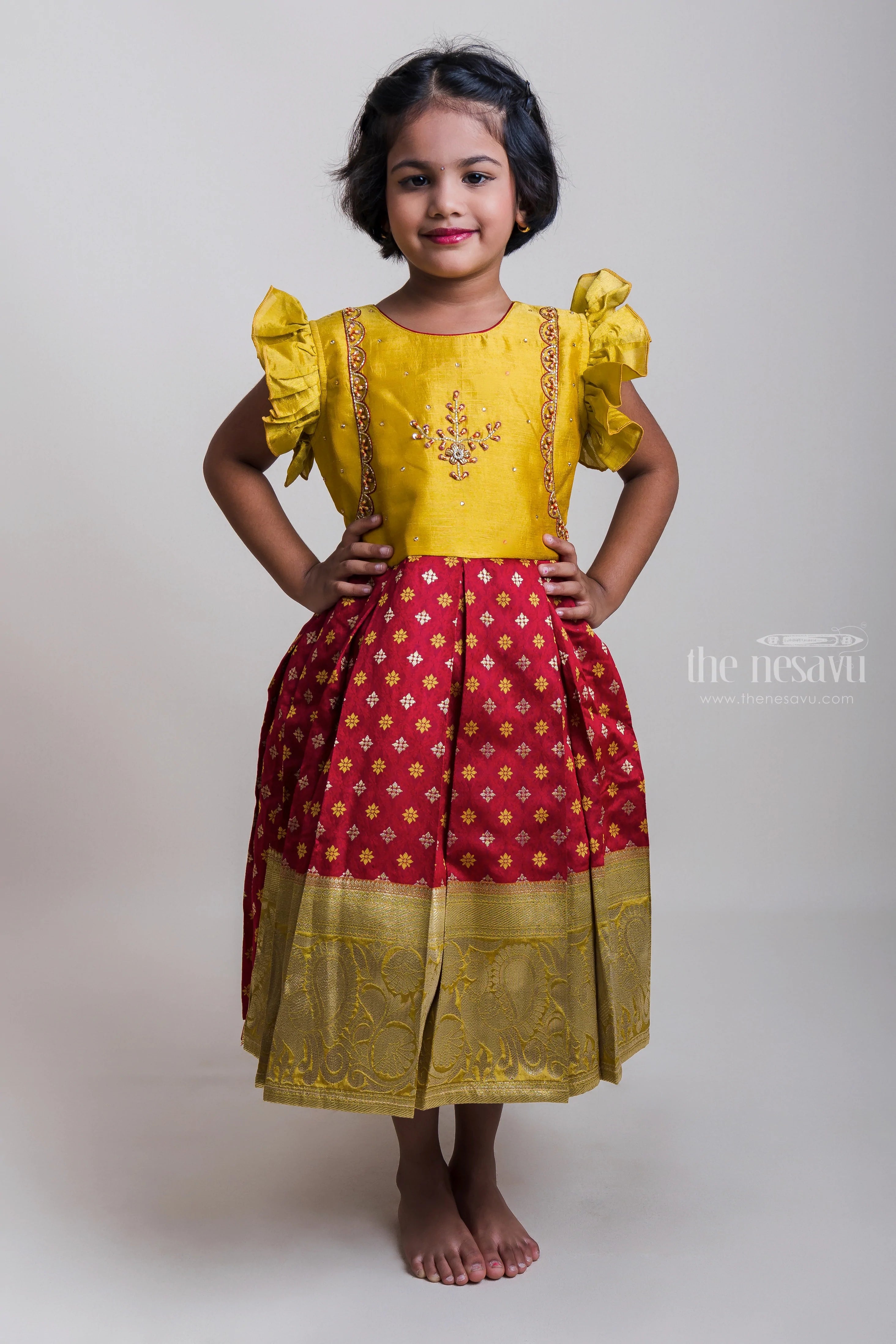 Yellow Embroidery Motif Yoke Semi-Silk Frock With Long Zari Border